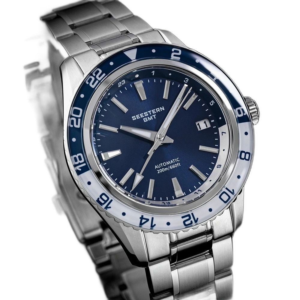 Seestern S456 navy-dial GMT on steel bracelet, angled view on black background