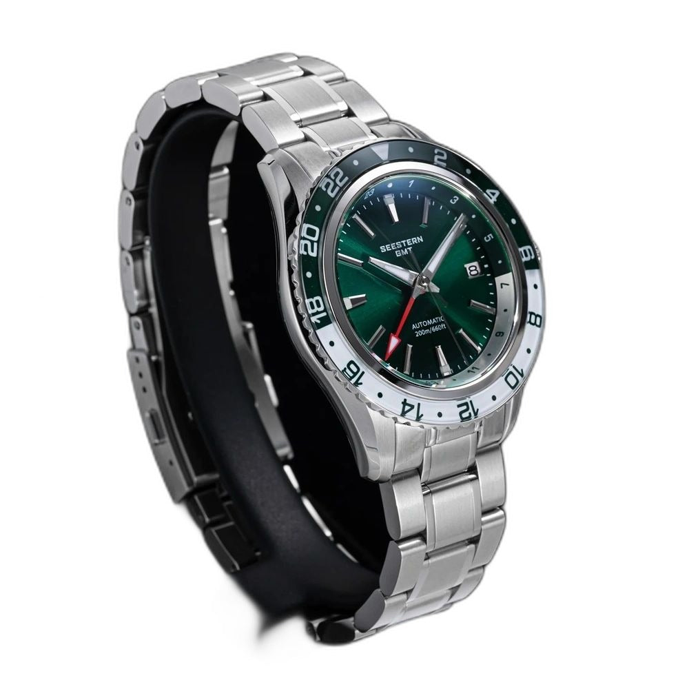 Seestern S456 green-dial GMT on steel bracelet, angled view with red GMT hand