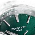 Seestern S456 green sunburst dial close-up with applied markers and SEESTERN GMT print
