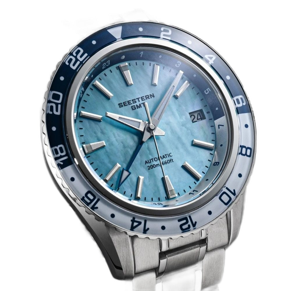 Seestern S456 ice blue MOP-dial GMT on steel bracelet, three-quarter angled view