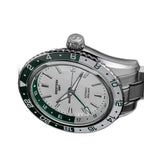 Seestern S456 white MOP-dial GMT with green bezel, low-angle close-up with starfish crown