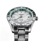 Seestern S456 white MOP-dial GMT with green bezel on steel bracelet, three-quarter angled view