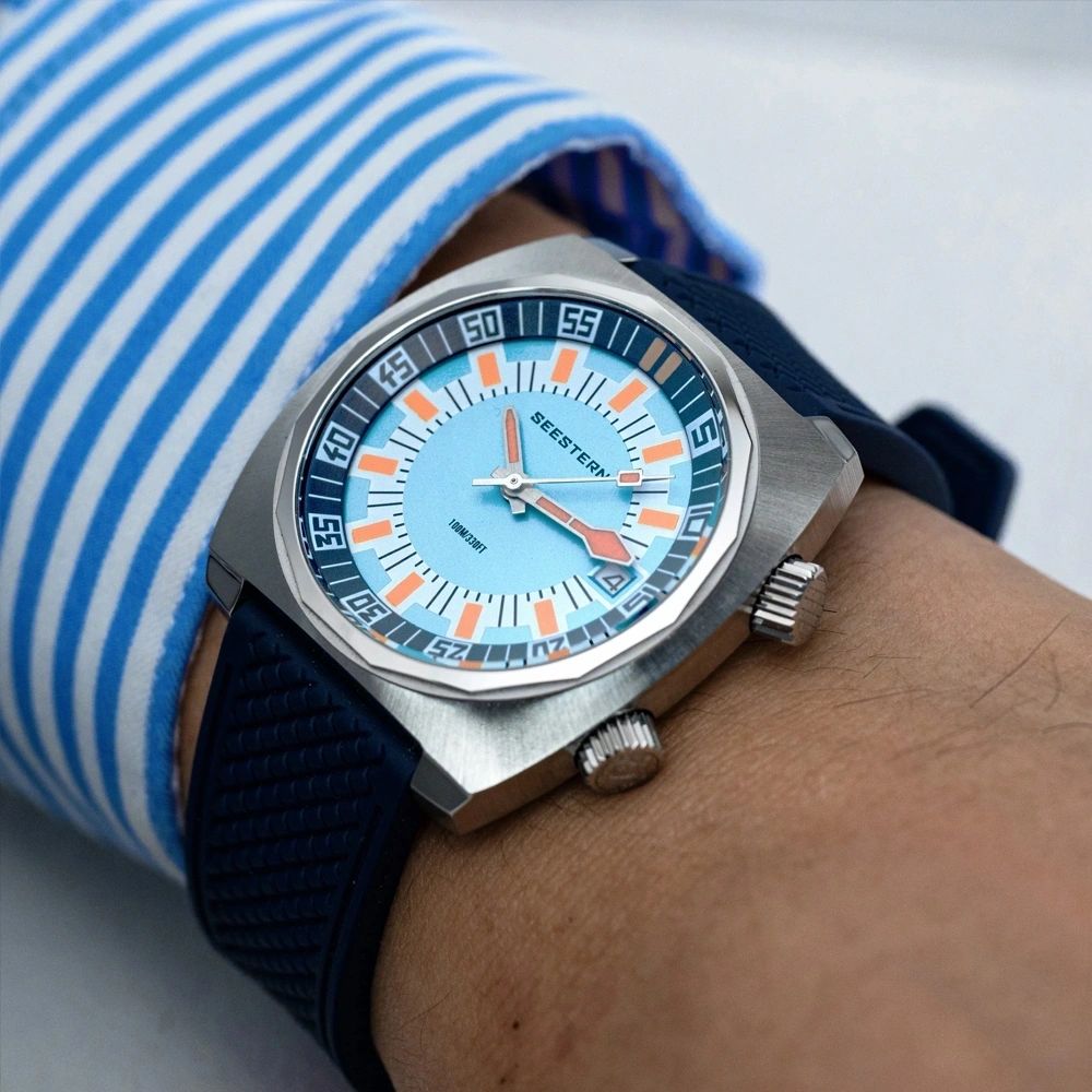 Seestern S471 light blue-dial double crown diver worn on wrist with navy rubber strap, close-up
