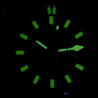 Seestern S471 diver dial glowing green lume in the dark, hour markers and hands close-up