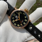Steeldive SD1903S bronze pilot watch three-quarter view with sunlit bronze case, black dial and onion crown