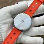 Steeldive SD1912 caseback view, polished 3000m dive watch caseback with Steeldive engraving on orange strap
