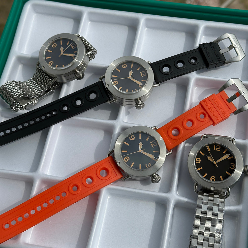 Steeldive SD1912 comparison of all four strap options: steel bracelet, mesh, black rubber and orange rubber