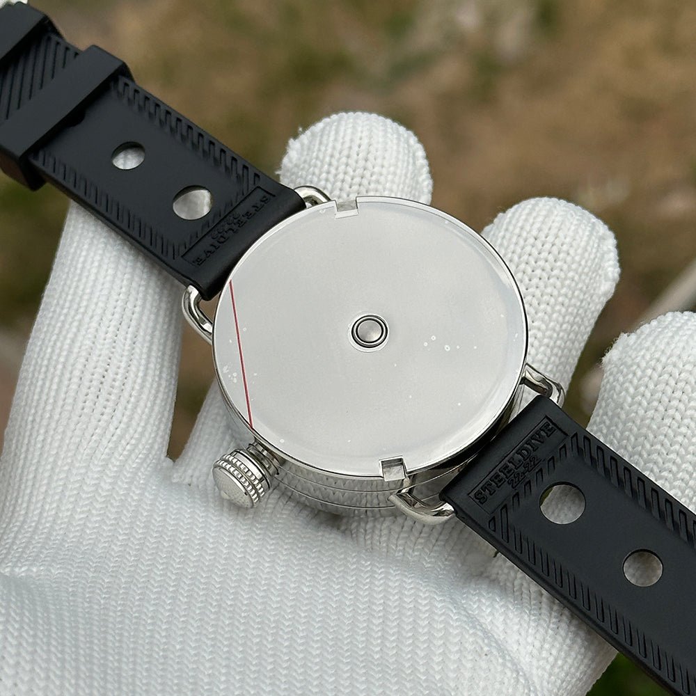 Steeldive SD1912 polished caseback with engraved Steeldive logo and black rubber dive strap