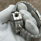 Steeldive SD1912 polished case crown detail with signed screw-down crown and mesh bracelet