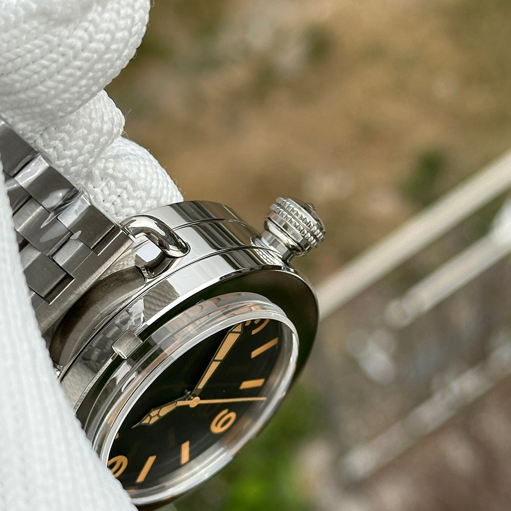 Steeldive SD1912 polished 47mm case profile macro showing signed crown and domed crystal