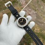 Steeldive SD1912 47mm sandblast diver on black holey rubber strap with steel buckle, angled view
