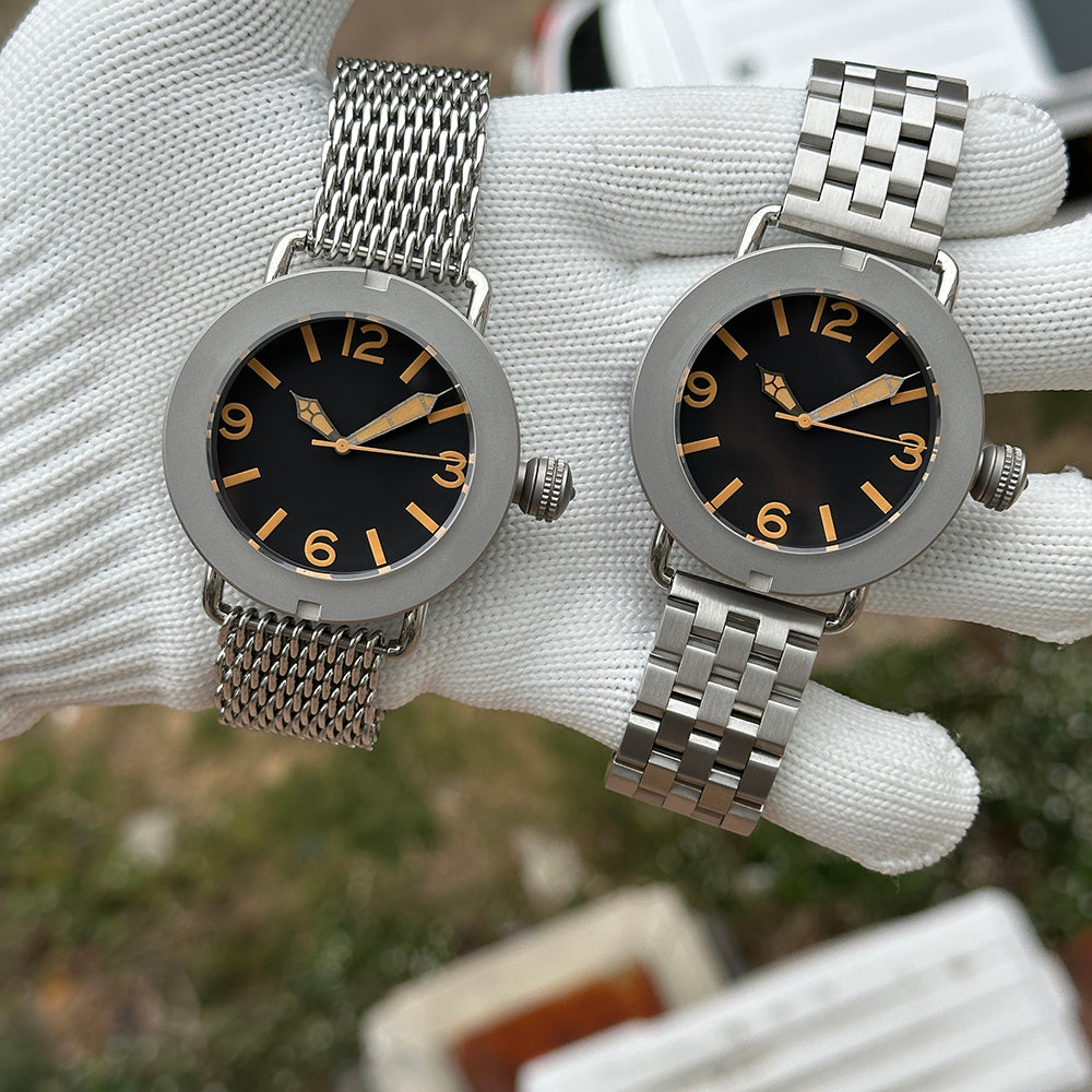 Steeldive SD1912 comparison shot, two 47mm sandblast divers on shark mesh and oyster bracelets side by side
