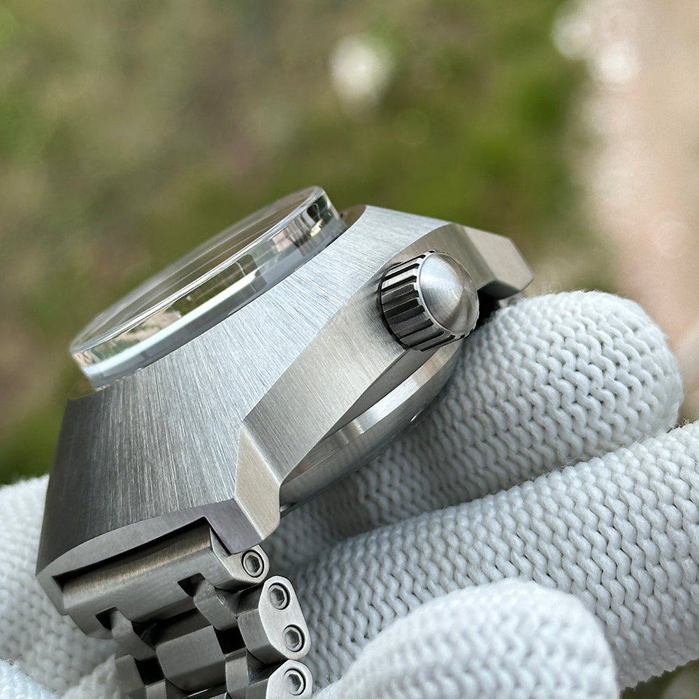 Steeldive SD1920 brushed steel case side profile with signed screw-down crown and domed crystal