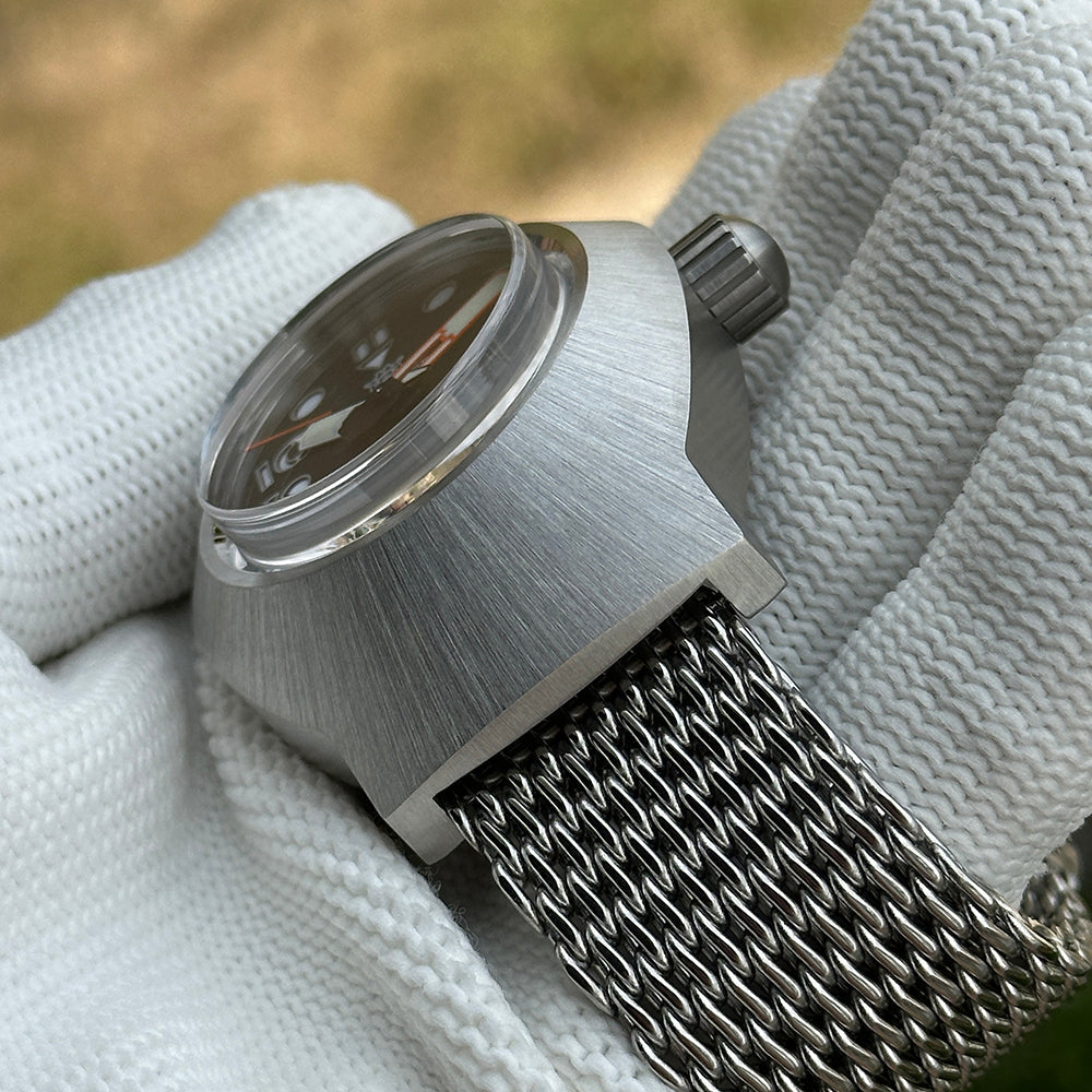 Steeldive SD1920 1000m diver profile showing domed sapphire crystal and mesh strap fitment