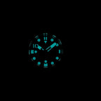 Steeldive SD1920 1000m diver lume shot showing bright blue-green glow on numerals, hands and indices