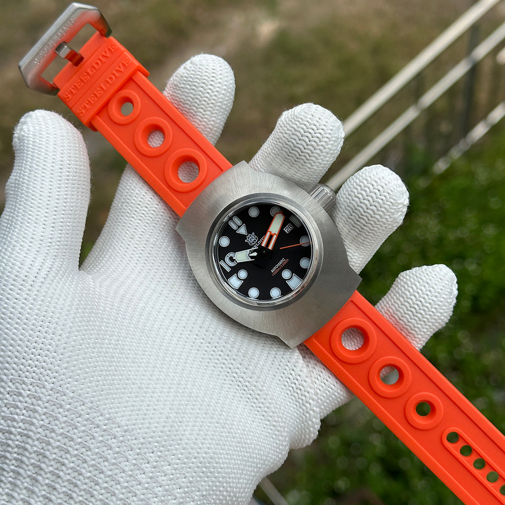 Steeldive SD1920 1000m diver wrist shot on bright orange perforated rubber strap with signed buckle