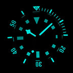 STEELDIVE SD1925 lume shot with hands, markers and bezel glowing aqua in the dark