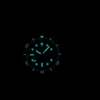 Steeldive SD1929 dive watch lume shot, cyan-green BGW9 luminescent indices and hands glowing in the dark