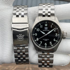 Steeldive SD1930 pilot watch with steel bracelet detached, clasp engraved with diver logo, front comparison