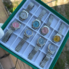 Steeldive SD1933 collection comparison tray showing eight dial colour variants on jubilee bracelets