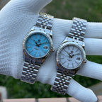 Steeldive SD1933 pair on hand showing sky blue dial beside white dial, jubilee bracelets