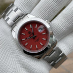 Steeldive SD1934 dive watch with black dial and oyster steel bracelet on white wrist roll