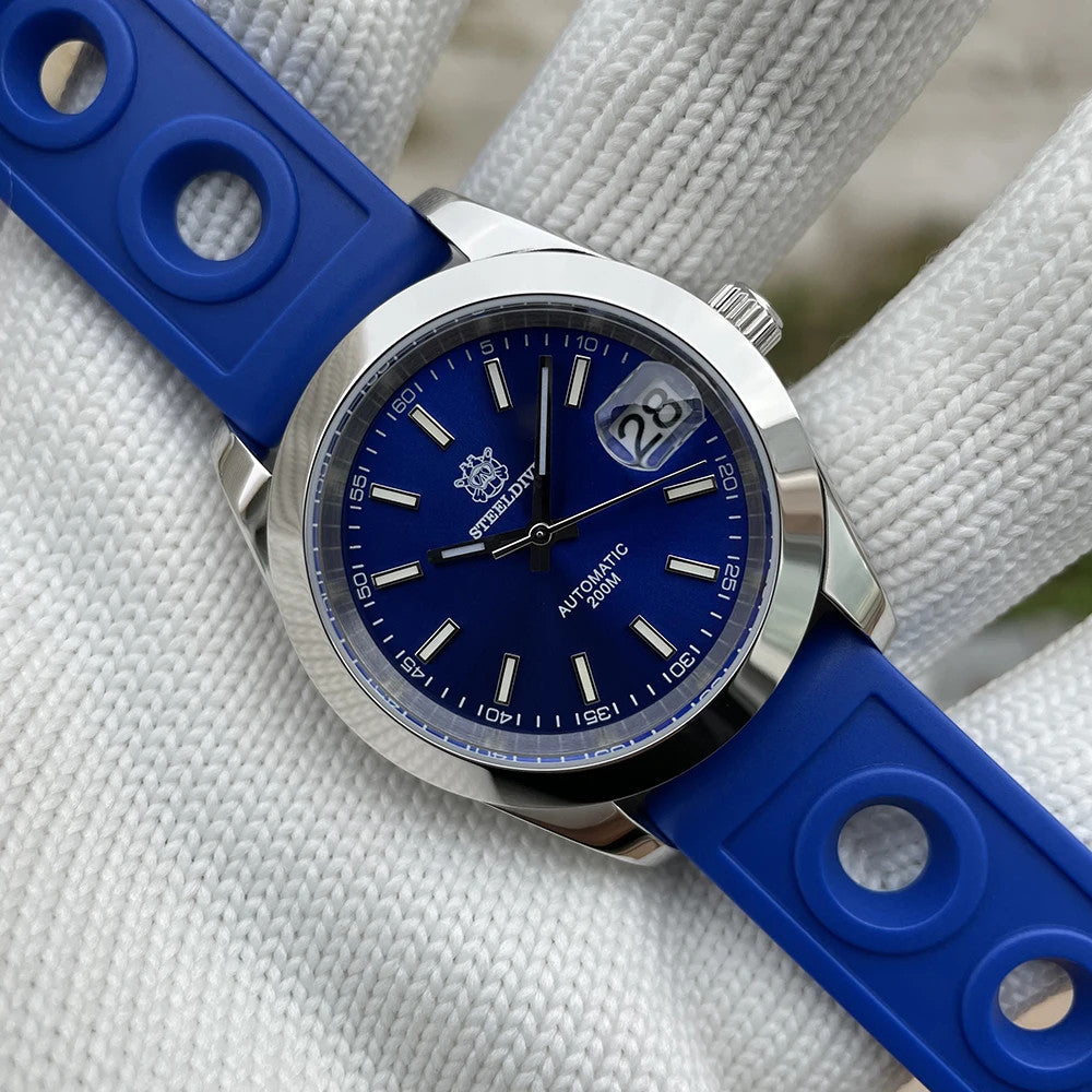 Steeldive SD1934 dive watch with blue dial and royal blue perforated rubber rally strap detail