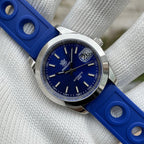 Steeldive SD1934 dive watch with blue dial and royal blue perforated rubber rally strap detail