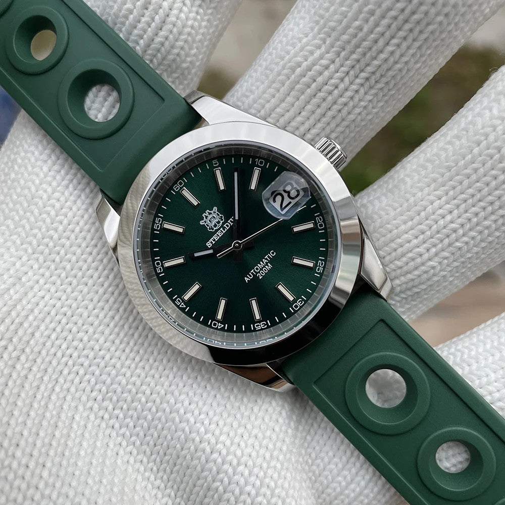 Steeldive SD1934 dive watch with green dial and green perforated rubber rally strap on wrist roll