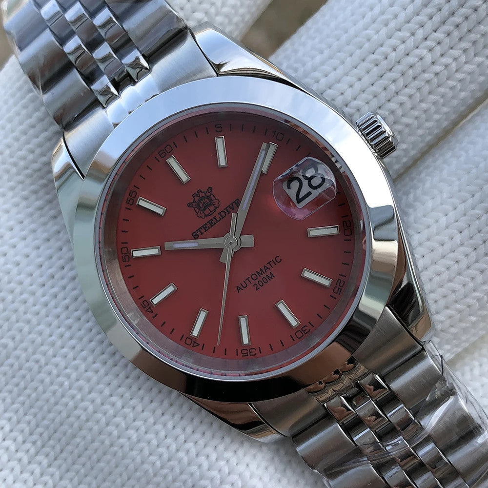 Steeldive SD1934 dive watch with red dial and jubilee bracelet angled on wrist roll