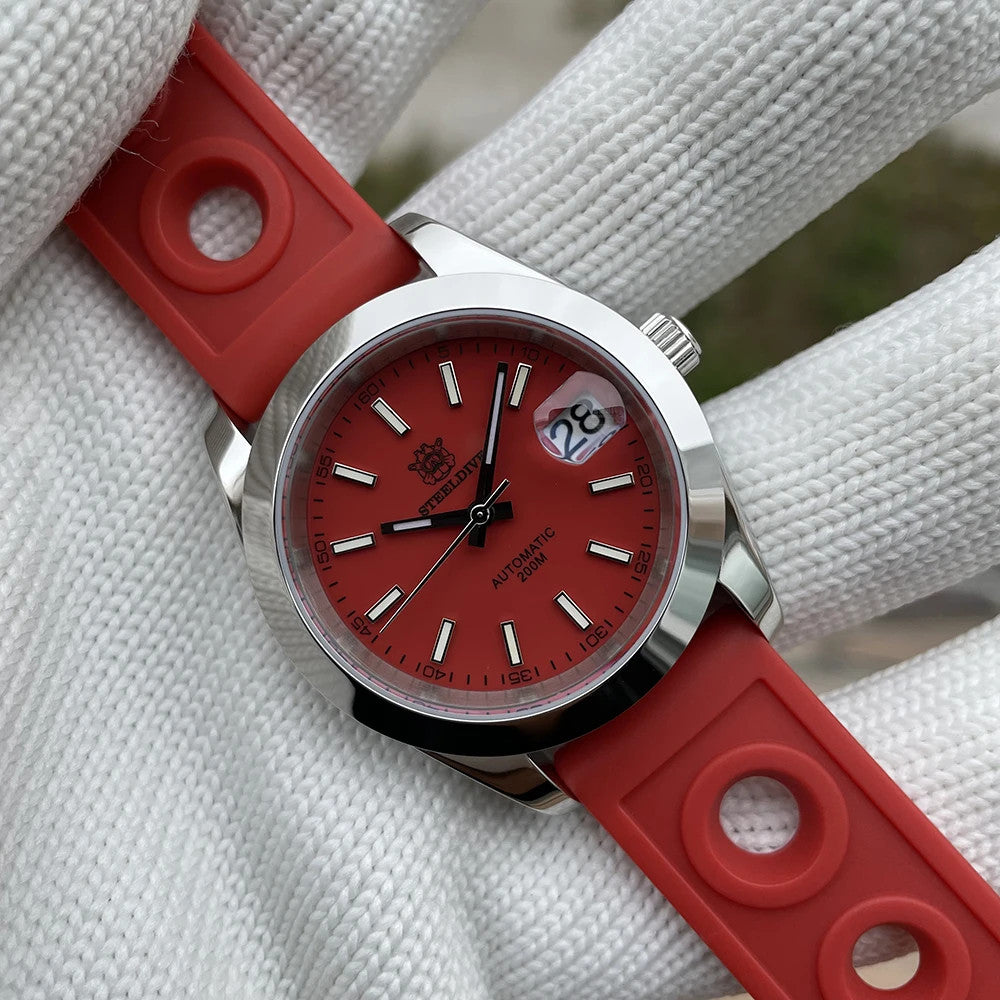 Steeldive SD1934 dive watch with red dial and red perforated rubber rally strap close detail