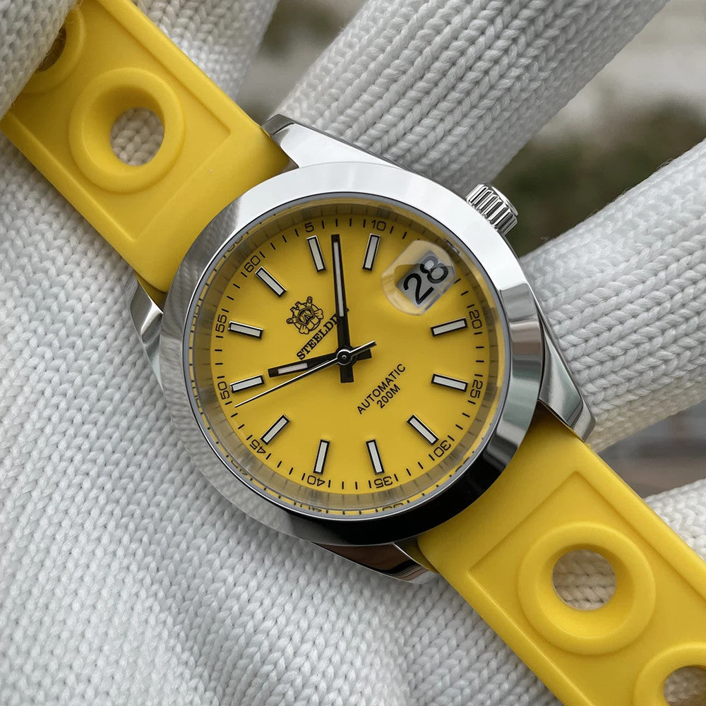 Steeldive SD1934 dive watch with turquoise dial and turquoise rubber rally strap on wrist roll