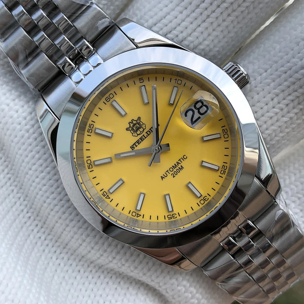 Steeldive SD1934 dive watch with yellow dial and oyster steel bracelet angled on wrist roll