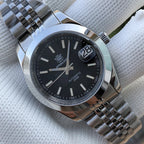 Steeldive SD1934 dive watch with yellow dial and yellow perforated rubber rally strap on wrist roll