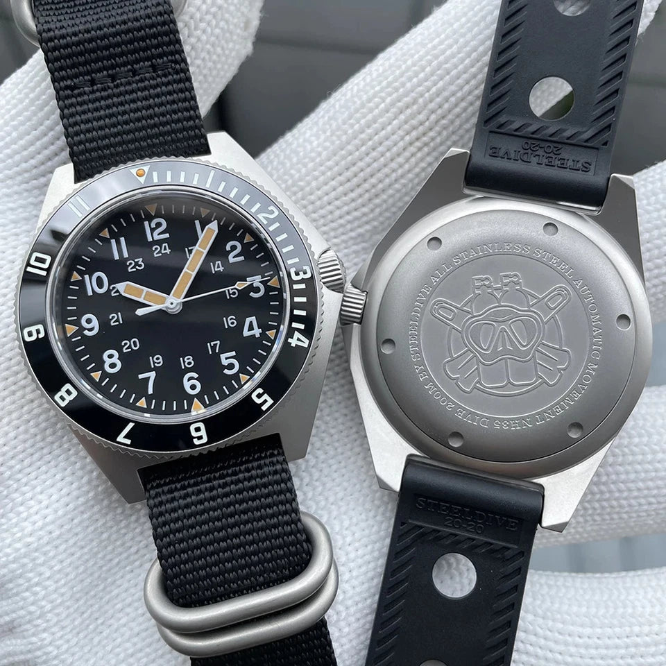 Steeldive SD1944 pair showing front view with black nylon strap and caseback with black rubber strap; stainless steel case, engraved caseback and black dial with orange markers.