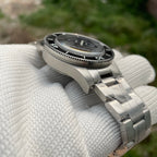 Steeldive SD1952 fifty fathoms diver side view with brushed steel bracelet and clasp, outdoor