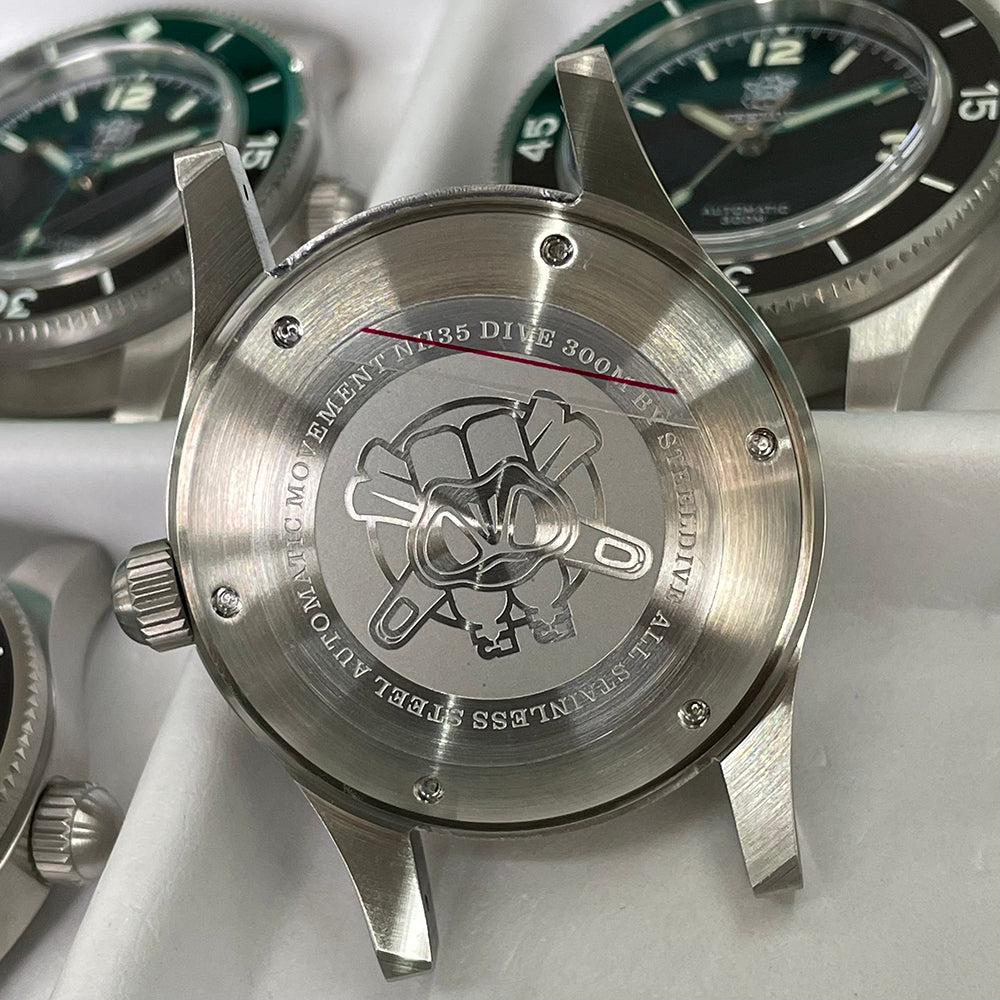 Steeldive SD1952 stainless steel caseback engraved with turtle logo and NH35 300M dive movement text