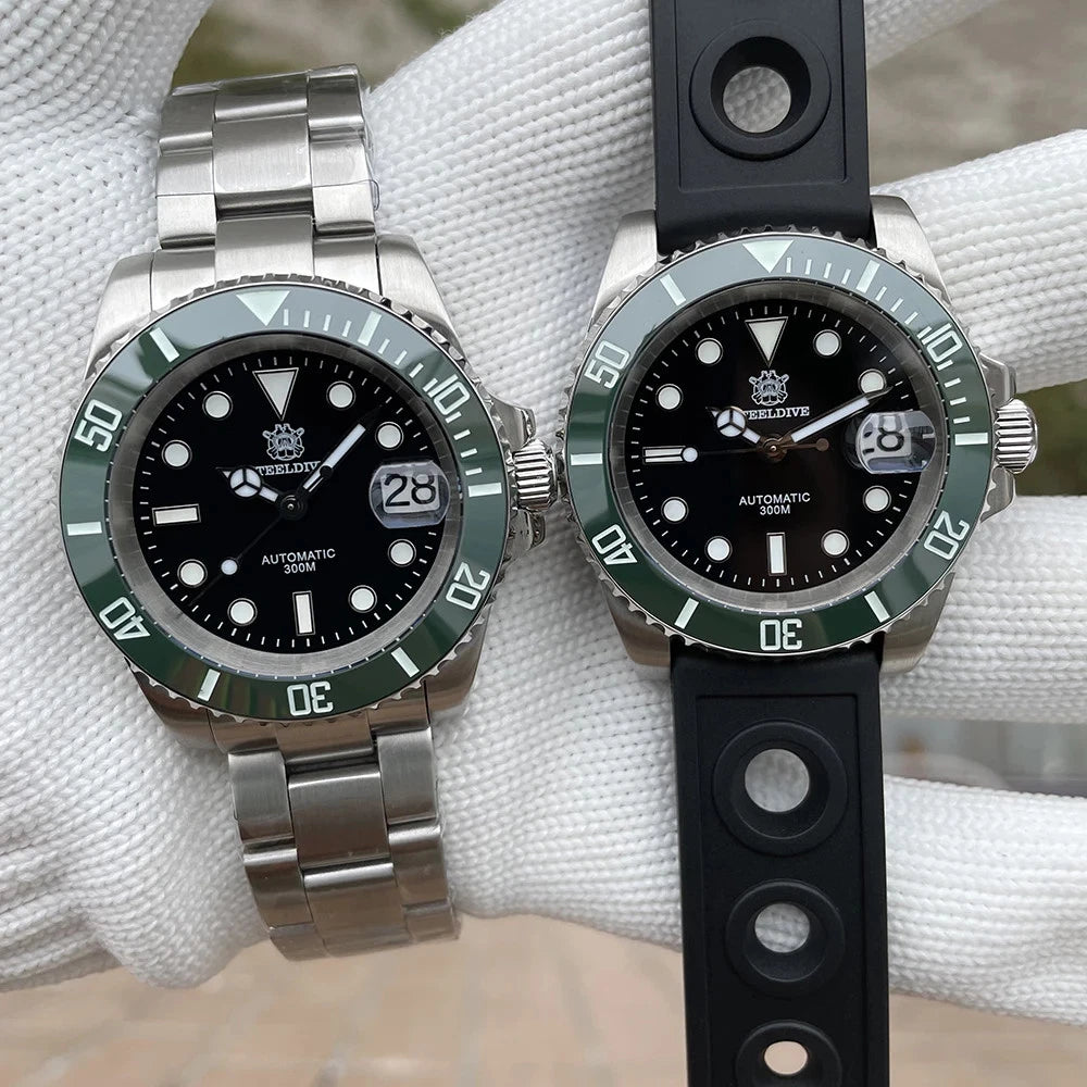 Side-by-side view of two Steeldive SD1953 automatic diver watches with black dials and green bezels: one with silver stainless steel bracelet and one with black rubber strap; luminous markers and bezels; date window at 3 o'clock; gloved hand holding.