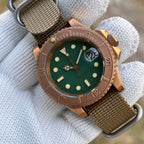 Steeldive SD1953S bronze dive watch with green dial, green ceramic bezel and khaki nylon strap lifestyle shot