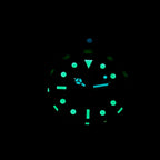 Steeldive SD1953S green-dial dive watch lume macro showing C3 green indices in total darkness