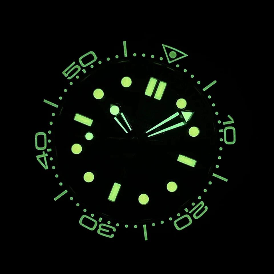 Steeldive SD1957 diver watch luminous dial glowing green markers and hands in dark, vintage bezel with green minute mSteeldive SD1957 diver watch luminous dial glowing green markers and hands in dark, vintage bezel with green minute markers, NH35 movement, 200m water resistance.arkers, NH35 movement, 200m water resistance.