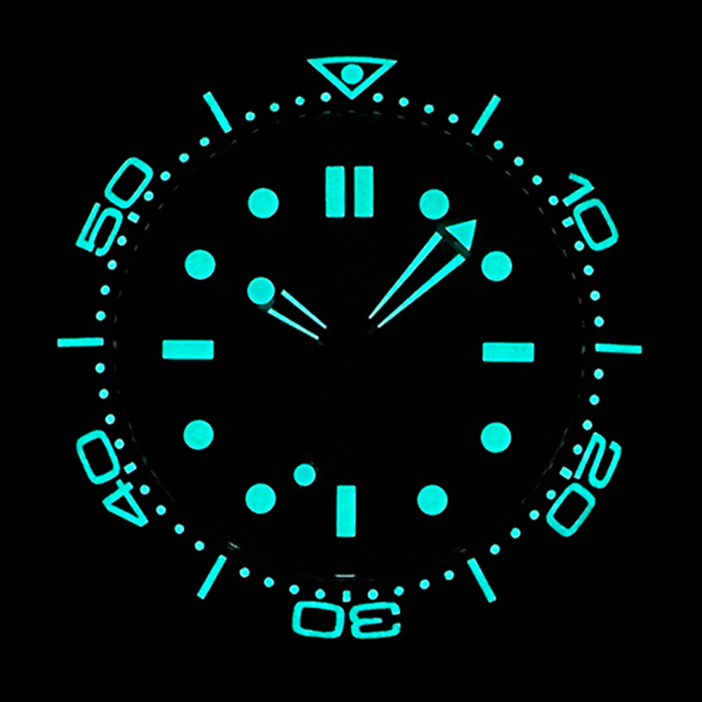 STEELDIVE SD1957L lume shot with hands, markers and bezel glowing blue in the dark