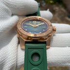 Steeldive SD1960S bronze dive watch bezel detail green dial with faceted screw-down bezel ring