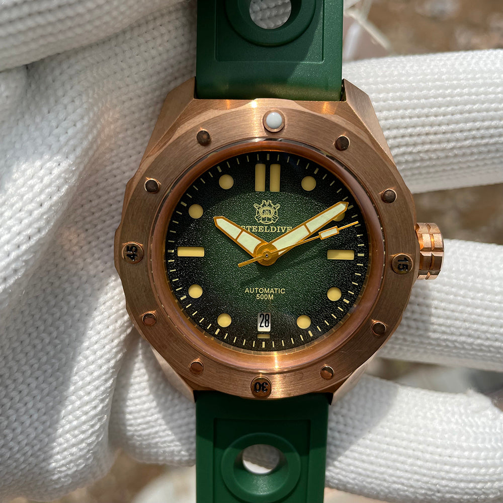 Steeldive SD1960S bronze diver green dial green rubber strap resting on white rope lifestyle shot