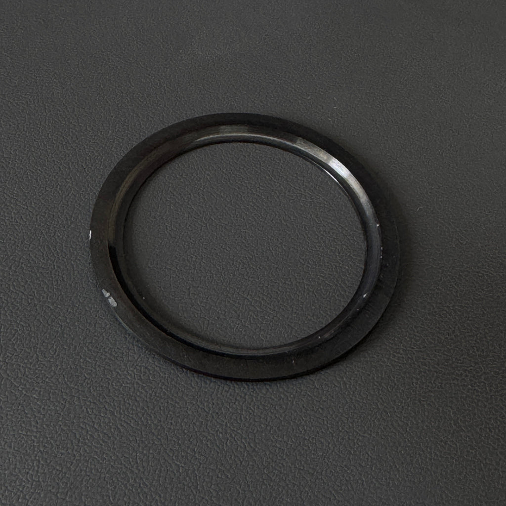 Steeldive SD1961 black ceramic bezel insert ring, side profile showing thickness and glossy edge