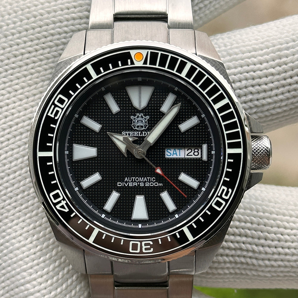 Steeldive SD1961 ceramic bezel insert fitted to host Samurai-style diver watch, front view on bracelet