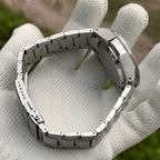 Steeldive SD1961 22mm steel bracelet curved on hand showing flat brushed links and micro-adjust holes