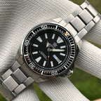 Steeldive SD1961 22mm steel bracelet fitted to black dial Samurai-style dive watch, front view