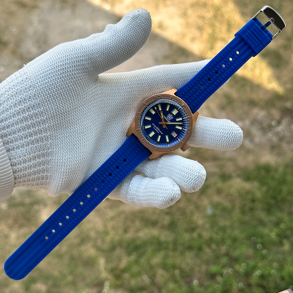Steeldive SD1962S bronze watch on blue ribbed rubber dive strap, flat layout