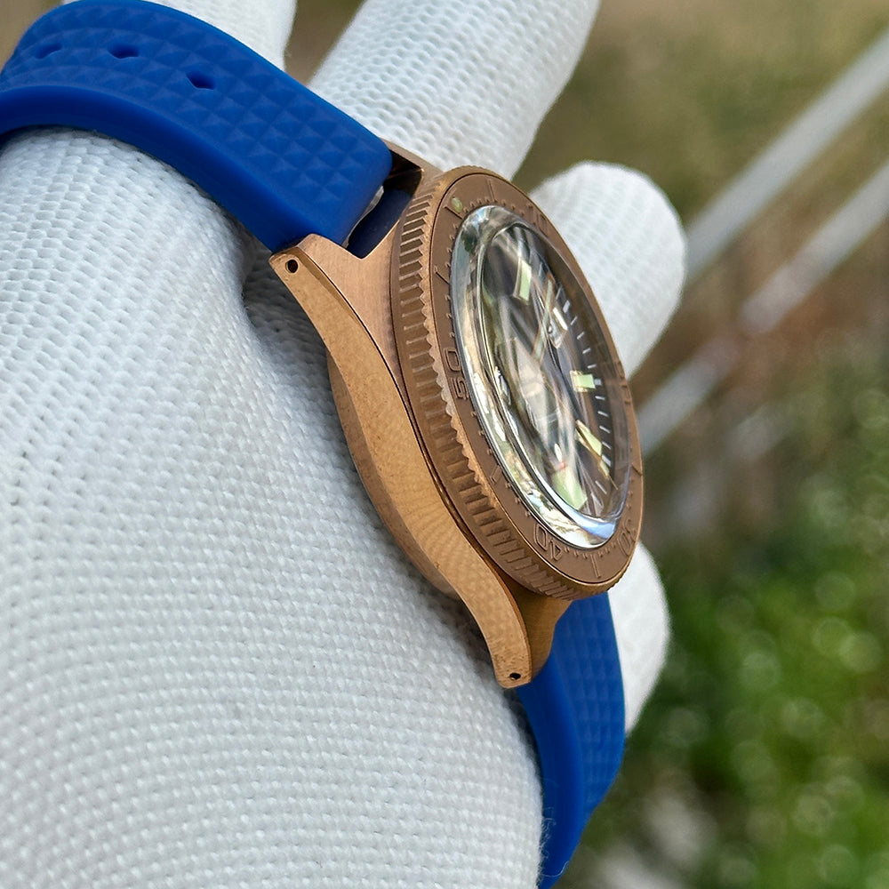 Steeldive SD1962S bronze bezel and brushed midcase profile with double-domed crystal, bezel detail